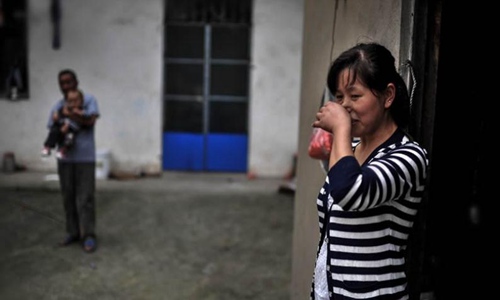 广西玉林容县拐卖妇女(广西容县一对夫妇生十五个孩子)