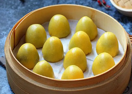 粘豆包蒸好了发红还能吃吗(粘豆包蒸出来发红)