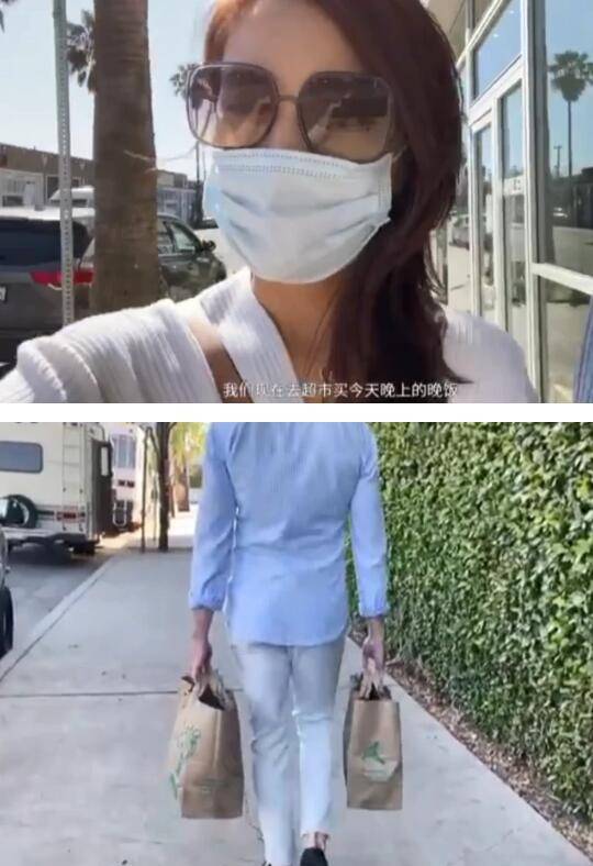 许婧在男友豪宅前拍照，男友在镜头下甜甜一笑，身穿吊带长裙，背影很美。